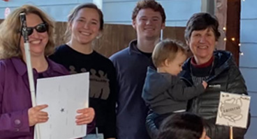 A group of NFB of Oregon members smile together.